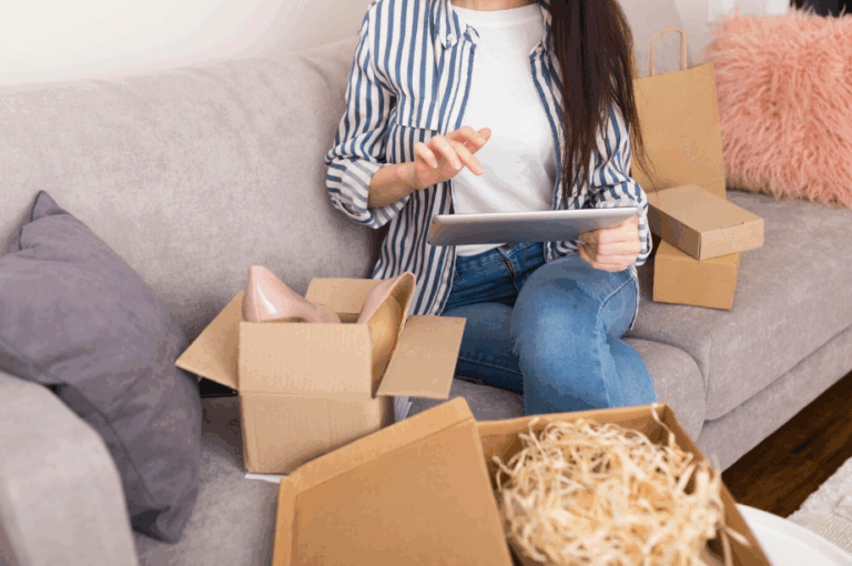 Woman exploring affordable subscription box alternatives while unboxing packages and shopping online from home.