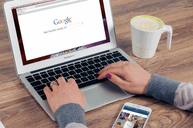 Person using a laptop and the best shopping browser extensions while online shopping.